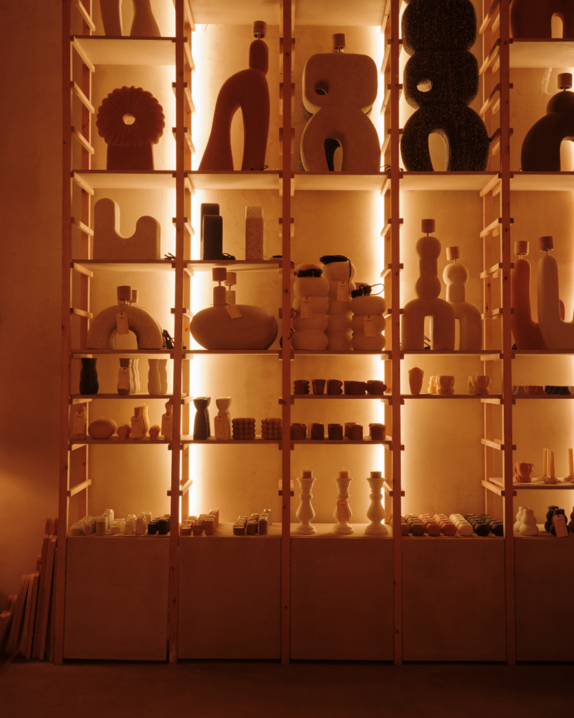 Shelves of ceramic candles and sculptures La Nena 